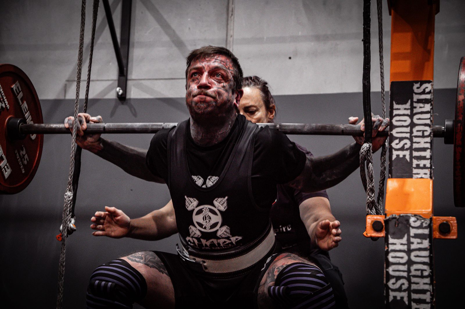 Tim Sharp at the bottom of a squat in the rack