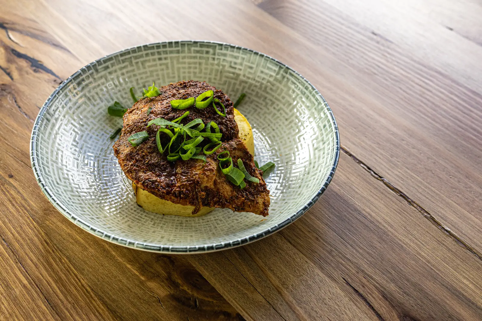 Spiced Portuguese chicken over lemon and herb potatoes